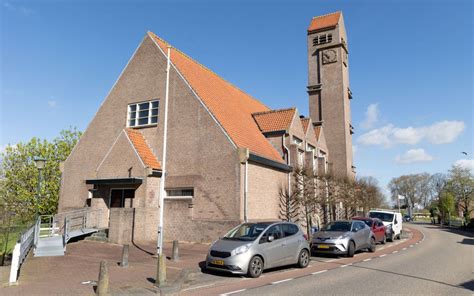 Aanzicht van de Hervormde Dorpskerk te Kinderdijk met de kenmerkende De Stijl architectuur