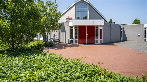 Foto van het kerkgebouw De Akker, van de Gereformeerde Kerk Vrijgemaakt in Vroomshoop.