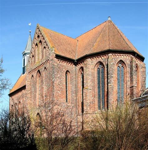 Artistieke impressie van de romaanse tufstenen kerk van Holwierde.