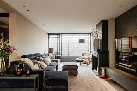 Interieurfoto van een woonkamer in Villa Marijke Elisabeth met comfortabele zitjes