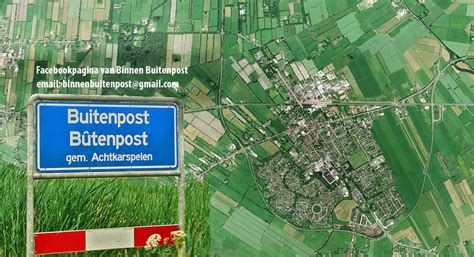 panoramafoto van Buitenpost met de kerk op de achtergrond