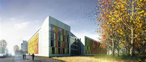 Een schoolgebouw met een warme, uitnodigende uitstraling, omringd door groen.