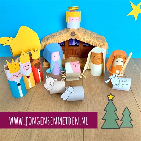 knutselwerk van een kerststal met wc-rollen en schoenendoos
