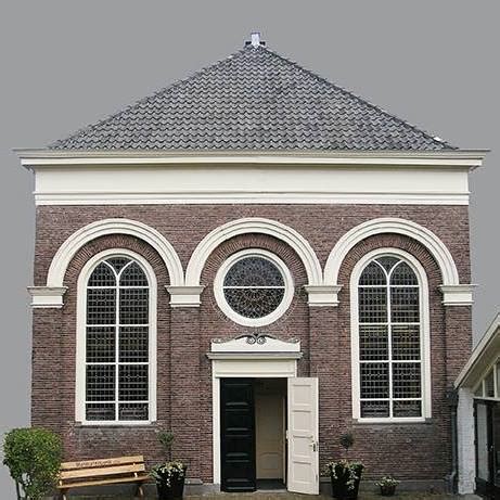 symbool van de doopsgezinde kerk (bijvoorbeeld een duif of een anker)